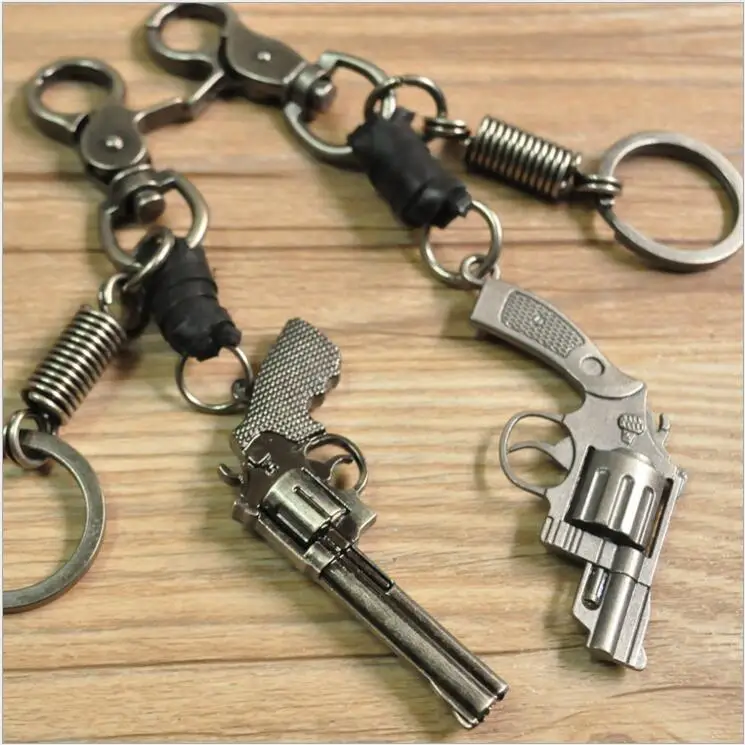 hot Classic Genuine Leather Revolver Pistol Weapon fashion Model Keychain Key Rings New Mini Gun key Chain For Men Jewelry Gift hot Classic Genuine Leather Revolver Pistol Weapon fashion Model Keychain Key Rings New Mini Gun key Chain For Men Jewelry Gift
