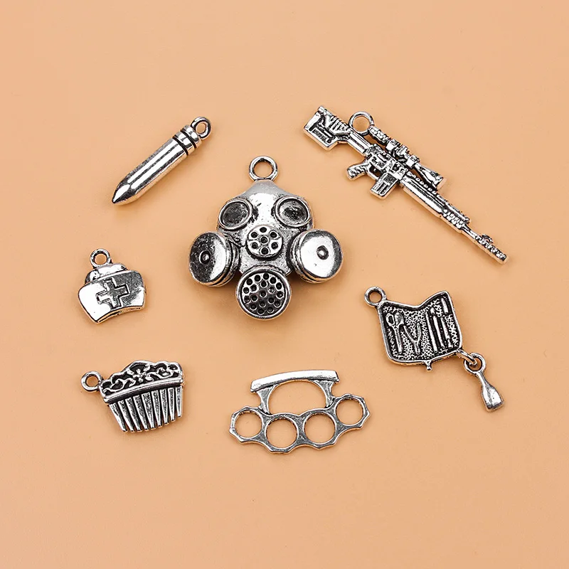 7pc mixed Antique Silver Charm Pendant sMasks Weapons Jewelry Making