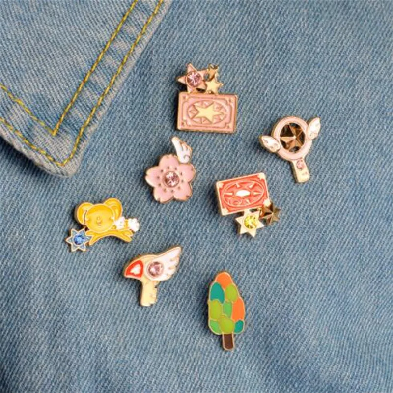 

WKOUD Card Captor Sakura Kero Sword Kinomoto Star Wand Key Sakura Lapel Pin Magical Girl Jewelry Cosplay Jewelry