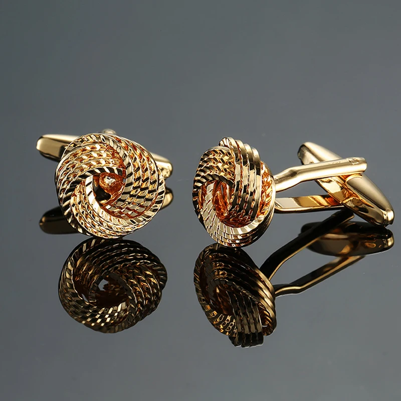

DY A new high quality brass material with golden spiral twist Cufflinks Men's French shirt Cufflink free shipping