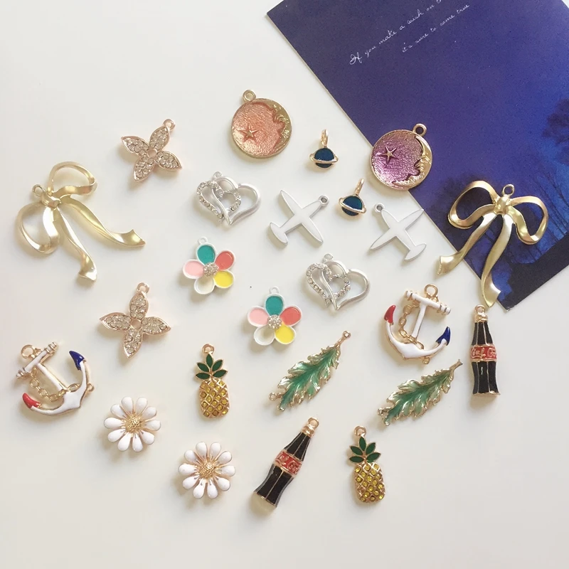 

2018 New 24Pcs/Pack 10-30MM Mix Flower Fruit Leaf Shape Glass Rhinestones KC Gold Color Alloy Jewelry Charms
