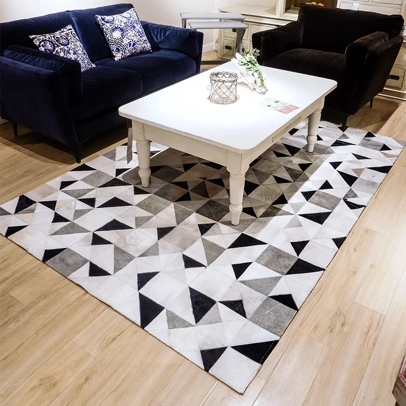 Geometric black white and gray triangles natural cowhide skin fur