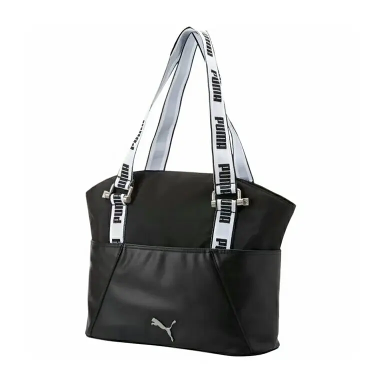 white and gold puma handbag