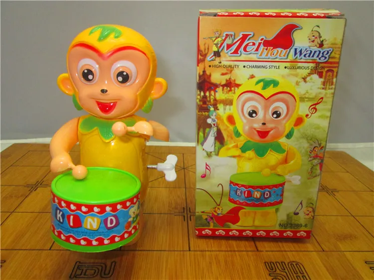 Wind up toys drum toy bear drumming monkey king drumming cartoon style