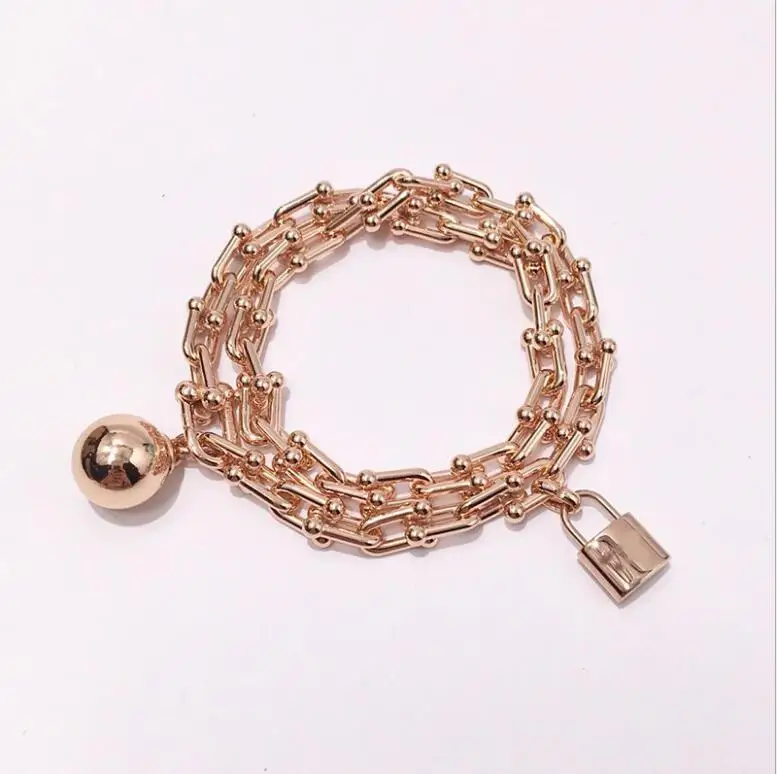 Armbanen voor vrouwen ювелирные изделия из титановой стали t образная u цепь замок мяч
