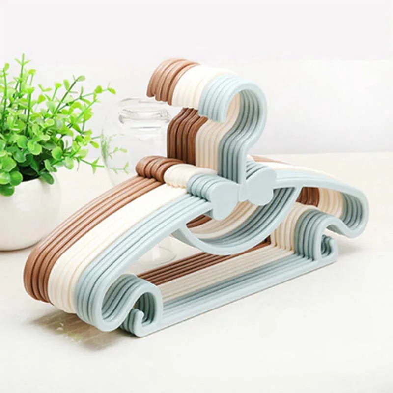 

4PCs/Lot bow-knot Clothes Hanger Kids Children Toddler Baby Clothes Coat Plastic Hangers Hook Household Hot Selling organizer
