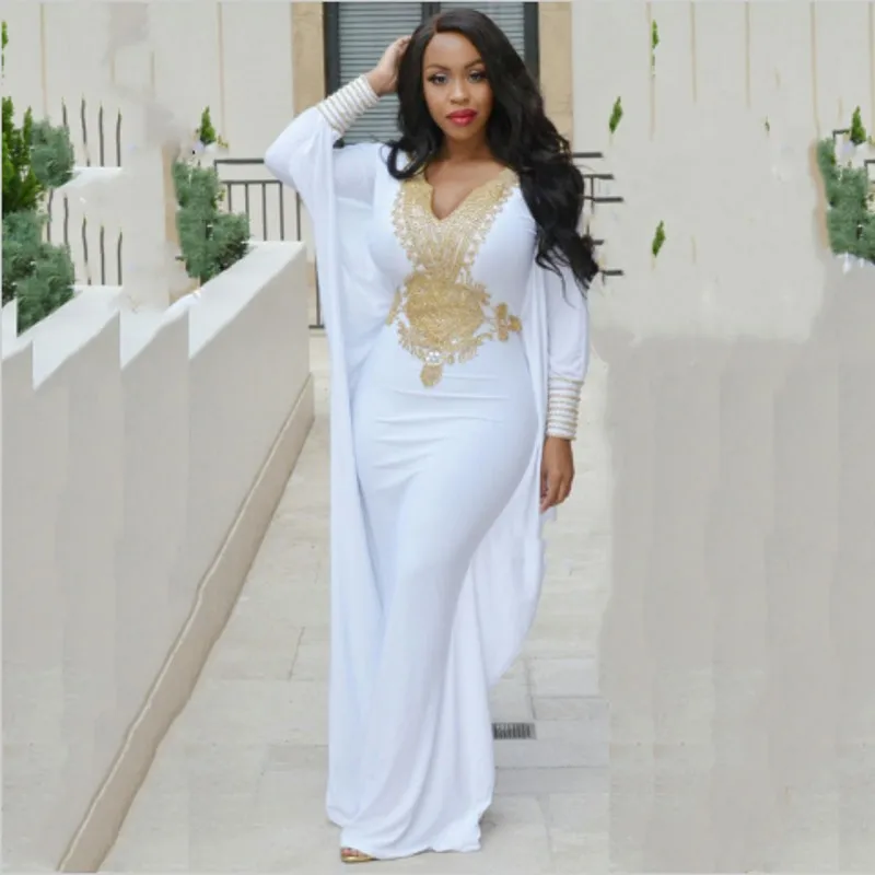white and gold kaftan abaya