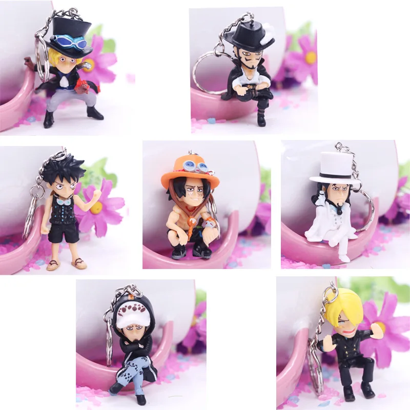

Anime One Piece 7pcs/set KeyChain Luffy Sabo Ace Character Key Chain Figure Toys
