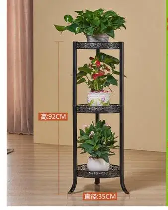 Iron art flower stand with floor type flowerpot. Balcony green flower shelf..