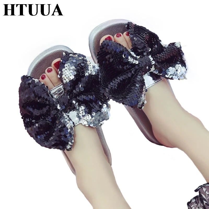 

HTUUA Fashion Glossy Sequins Bow Women Slippers Flat Slides Summer Sandals Slip On Ladies Shoes Woman Beach Flip Flops SX2567