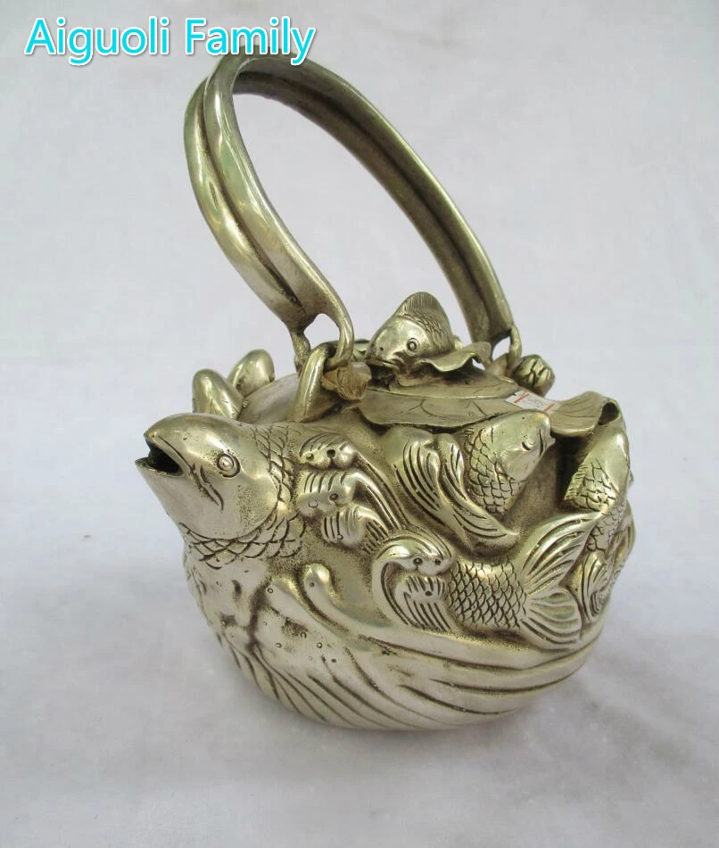 

Art collection old chinese handmade tibet silver 9 fish tea pot/metal teapot craft for home decoration