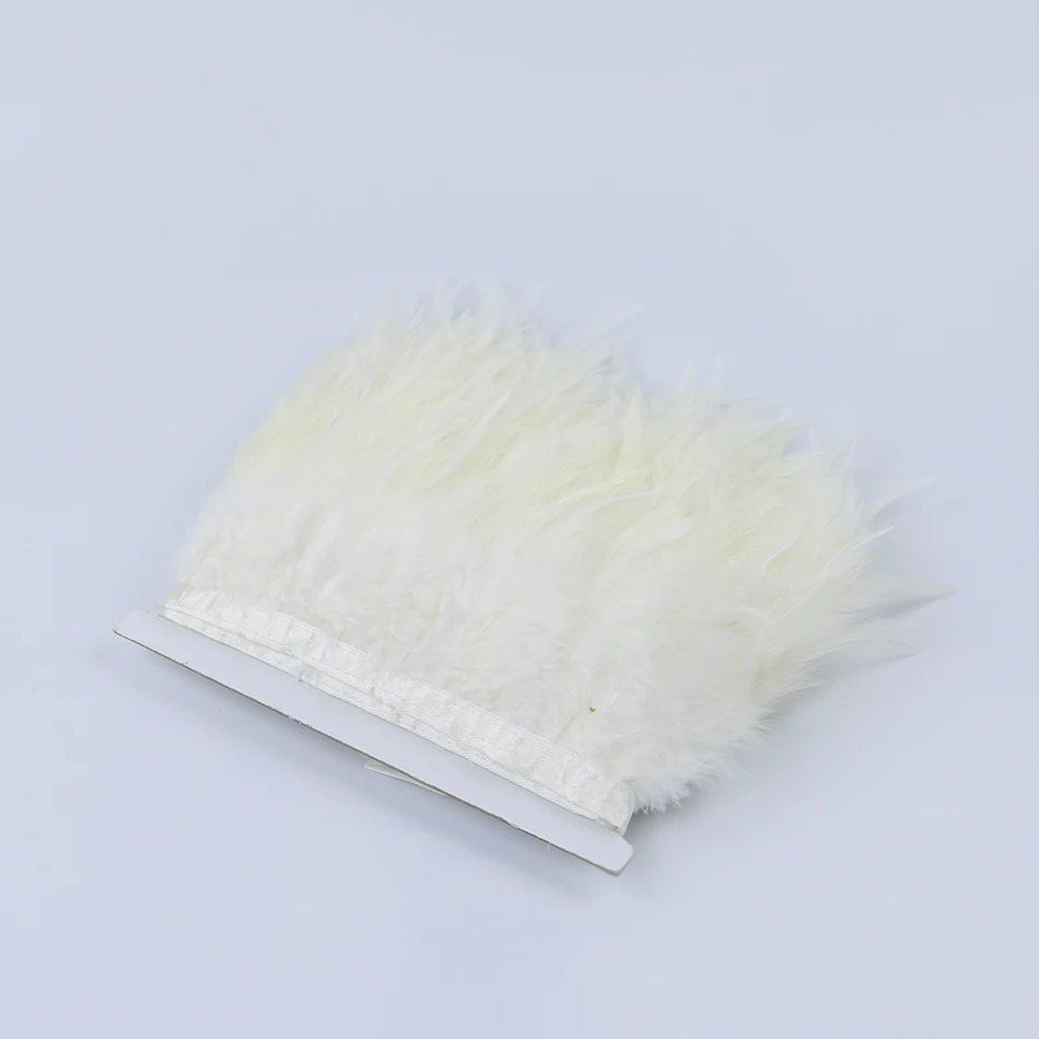 1 white rooster saddle feather trims 2
