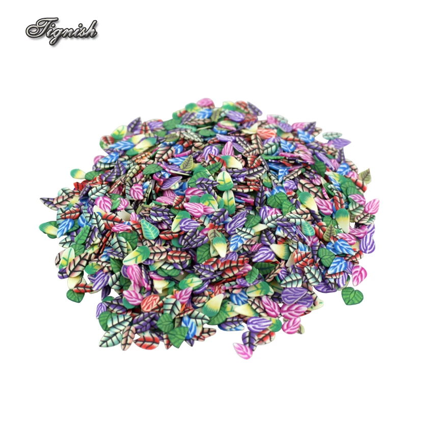

Tignish 1000Pcs/Pack Fimo Clay Fashion Feather Fruit Flowers Animals DIY 3D Nail Art Sticker Tip Rhinestone Decoration