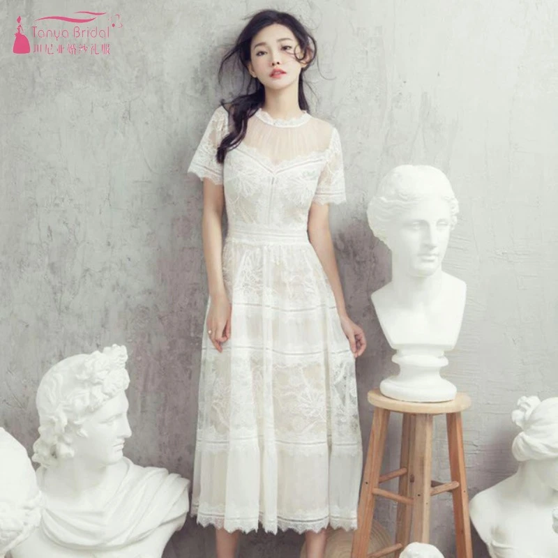 beige tea length dress