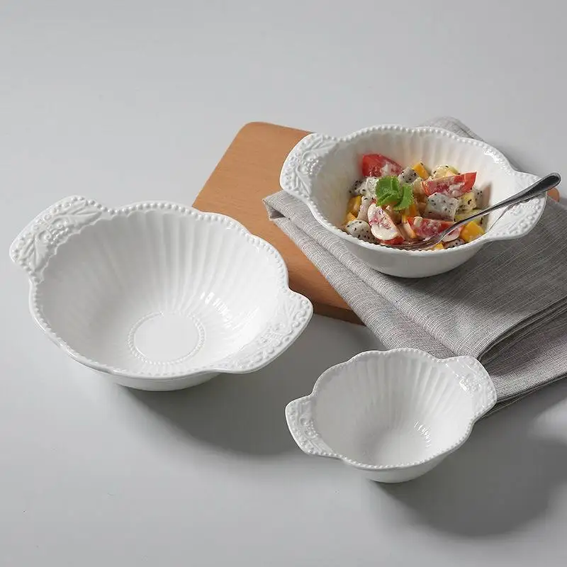 

Pure white bone porcelain bowl creative relief ceramic salad bowl Japanese and Korean fruit bowl dessert salad bowl.