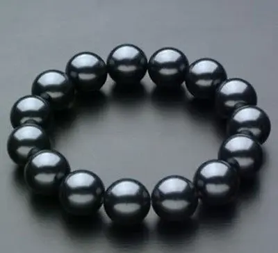 

FREE SHIPPINGWonderful South 12mm Black Sea Shell Pearl Bracelet AAA 7.5''02