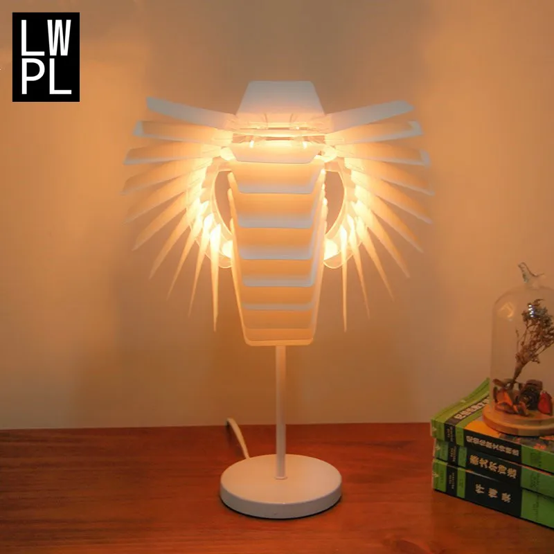 

The Nordic Contracted and Contemporary Bedroom Living Room Desk Lamp of The Head of A Bed Creative European Eye LED