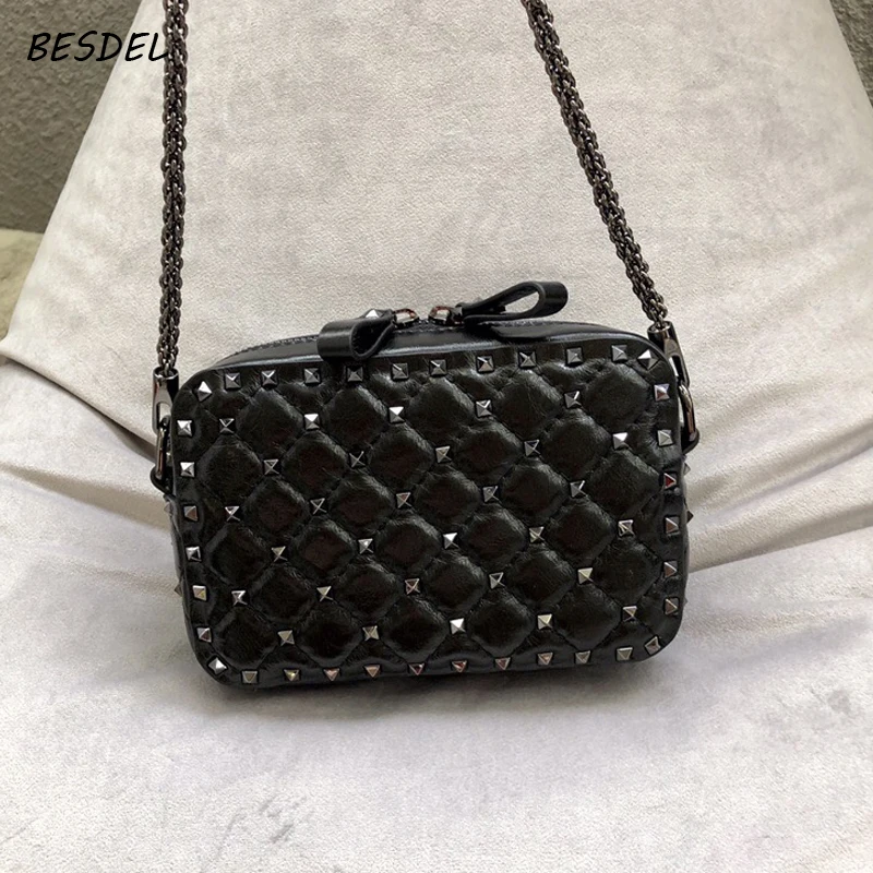 

MJ female bag camera bag 18 new winter mascherano spell wide shoulder straps color rivet slanting female bag, small party bag