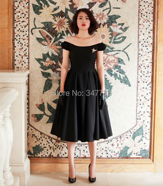 boat neck black dress audrey hepburn