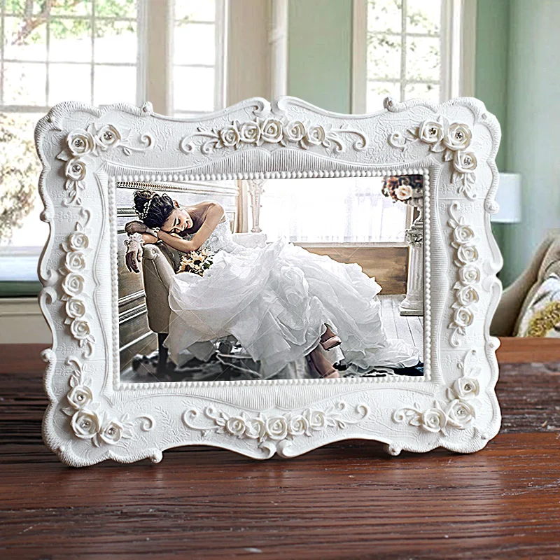 Marco de fotos blanco estilo europeo marcos de 6 pulgadas accesorios de decoración de resina rosas estéreo decorado regalo de boda Venta caliente X $ Marco de fotos blanco estilo europeo marcos de 6 pulgadas accesorios de decoración de resina rosas estéreo decorado regalo de boda Venta caliente X $