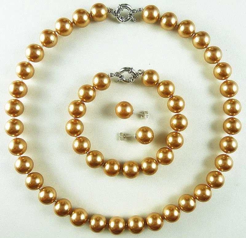 

Free shipping New style Natural noble jewelry>>>>AAA+ 14mm gold champagne luxurious shell pearl bracelet earring necklace set