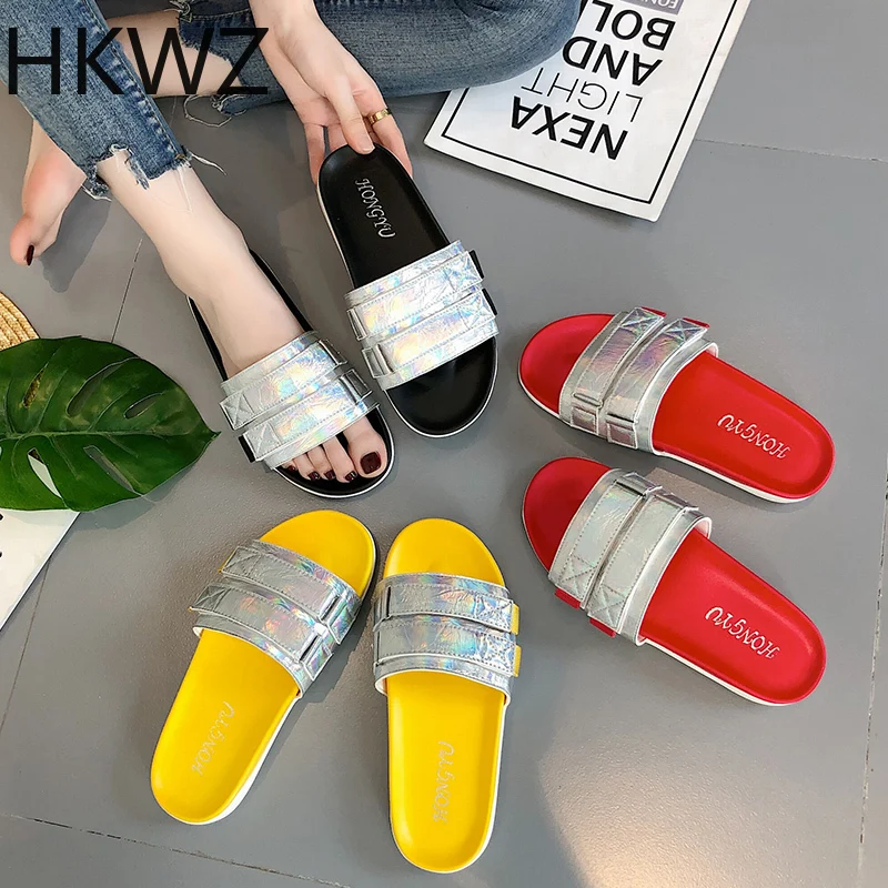 

Summer brand new flat-bottom casual bright sequins ladies slippers beach wear thick bottom wild word drag comfortable sandals