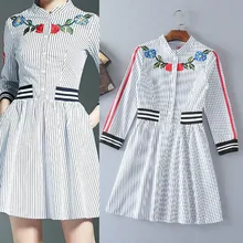 The new spring and summer 2017 European women’s high quality heavy collar long sleeved striped embroidery slim dress