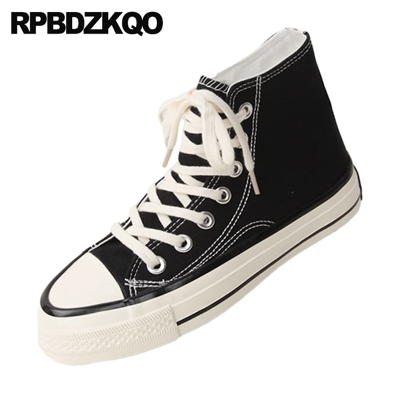 black thick sole trainers