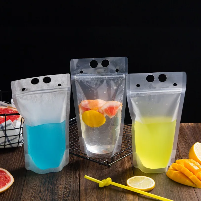 

50pcs/lot New Plastic Drink Packaging Bag Pouch for Beverage Juice Milk Coffee with Handle and Holes for Straw 400ml 500ml