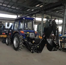 Supply All Kinds of Tractor and Provide a Loader With a 4 in 1 Bucket and a Backhoe