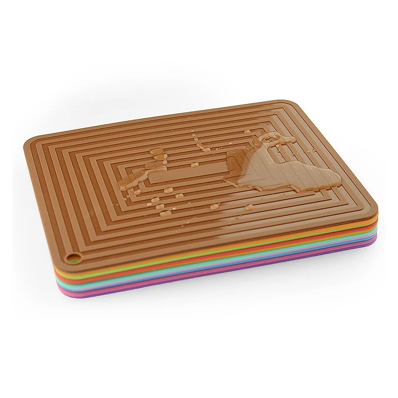 Flexible Silicone Trivets - Multi-purpose Silicone Pot Holders, Spoon Rest Kitchen Table Mat - Non Slip Hot Pads and Coasters Flexible Silicone Trivets - Multi-purpose Silicone Pot Holders, Spoon Rest Kitchen Table Mat - Non Slip Hot Pads and Coasters