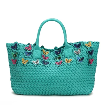 

Weaving female bag big bag 2018 new shoulder bag hand Korean butterfly fashion casual vegetable basket lady bag