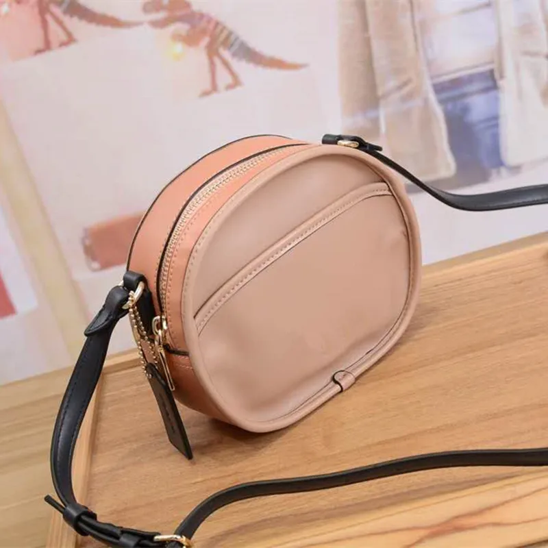 

Luxury brands new round handle bag Single Shoulder Satchel small round bag