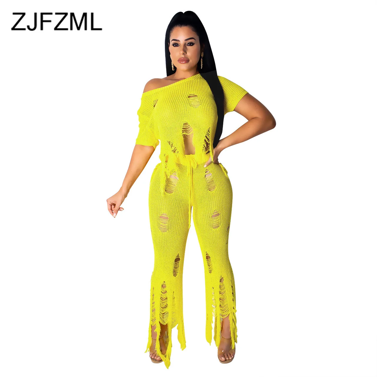 قطع الشرابة سترة 2 قطعة وتتسابق للنساء قصيرة الأكمام محبوك المحاصيل قمم + Bodycon السراويل بدل رياضية رجالي وحريمي الصيف مطابقة مجموعات