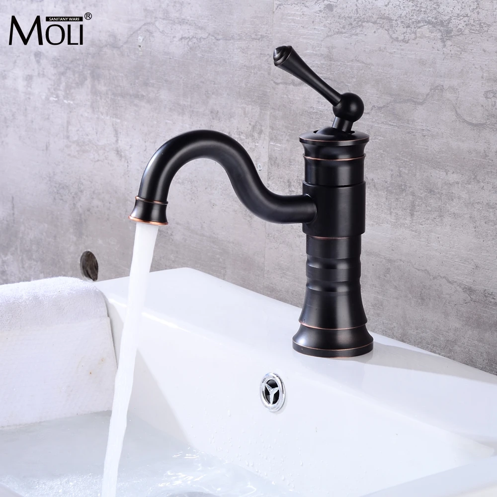 

Bathroom Basin Sink Faucets 360 Degree Swivel Oil Rubble Bronze American Style Hot and Cold Water Mixer