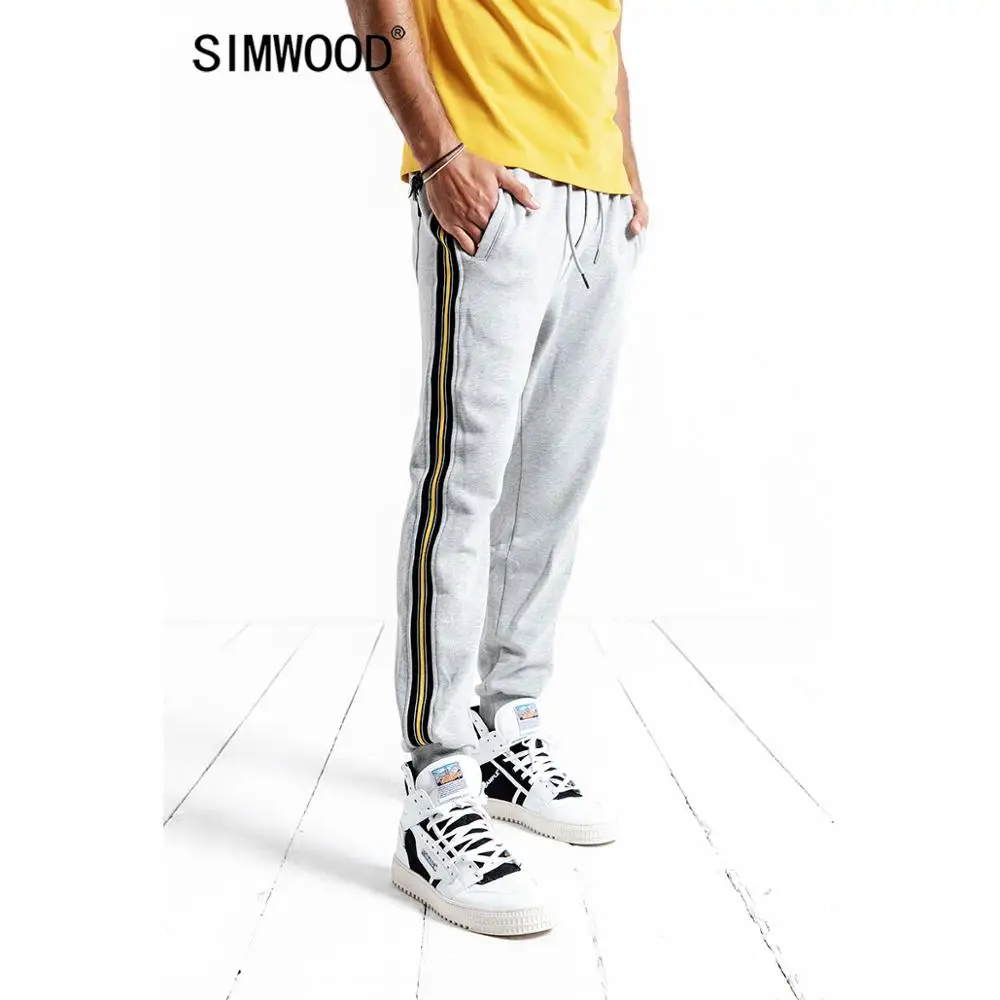 SIMWOOD الجانب التباين شريط ركض السراويل الرجال 2019 الربيع الصيف الرباط القطن السراويل الترنك بناطيل كاجوال 190197