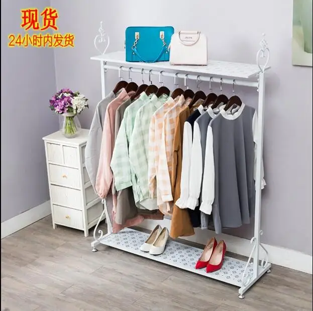 

Simple air coat hanger on single pole type indoor double pole iron art display rack