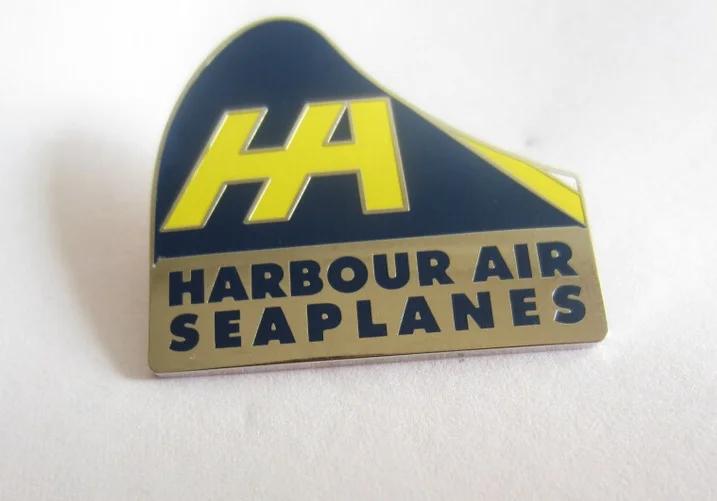 

custom enamel pin badge with yellow and blue enamel, nickel plating