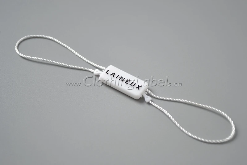 Hang tag string, plastic seal, attach to hang tags, clothing label