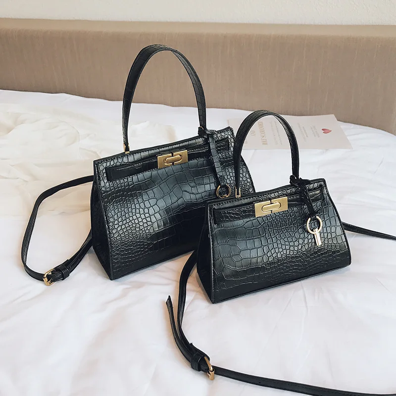 

2019 New ladies' bags, single shoulder bags, fashionable 100-lap handbag, small stone-striped square bag with sloping slings.