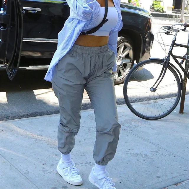 2019 kobiety Flash spodnie odblaskowe wysokiej talii spodnie na co dzień noc świecące Streetwear damskie elastyczne odblaskowe spodnie do biegania tanie tanio Poliester Pełnej długości Luźne Suknem Elastyczny pas Kieszenie Stałe Wysoka Plisowana Harem spodnie Reflective Pants women 2019 kobiety Flash spodnie odblaskowe wysokiej talii spodnie na co dzień noc świecące Streetwear damskie elastyczne odblaskowe spodnie do biegania tanie tanio Poliester Pełnej długości Luźne Suknem Elastyczny pas Kieszenie Stałe Wysoka Plisowana Harem spodnie Reflective Pants women