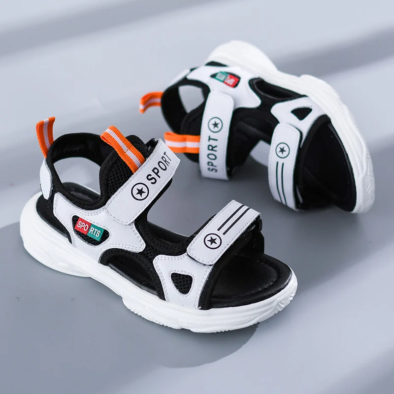 

2019 summer boy sandals new Korean version of the tide big boy student boy soft bottom children's beach shoes