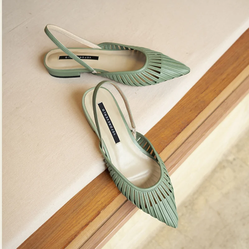 

2019 summer new pointed leather women's slippers style strange flat sandals