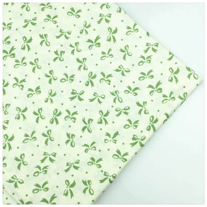 

Syunss,Green Bow Printed Twill 100%Cotton Fabric DIY Tissu Patchwork Telas Sewing Baby Toy Bedding Quilting Cloth Craft Tecido