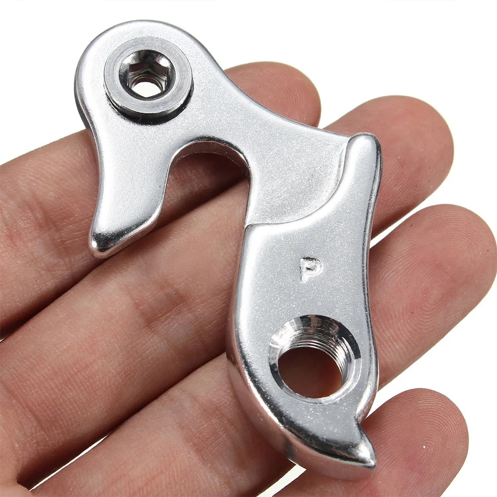العروة الثابتة الذيل هوك مسمار تعليق جهاز الطريق الدراجة الخلفية Derailleur نقل أجزاء الفضة سبائك الألومنيوم الإطار دراجة العروة الثابتة الذيل هوك مسمار تعليق جهاز الطريق الدراجة الخلفية Derailleur نقل أجزاء الفضة سبائك الألومنيوم الإطار دراجة