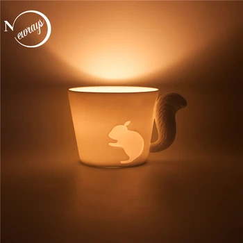 

Modern creative white color porcelain cup candlestick squirrel & rabbit shape relief candlestick cup not contain candles