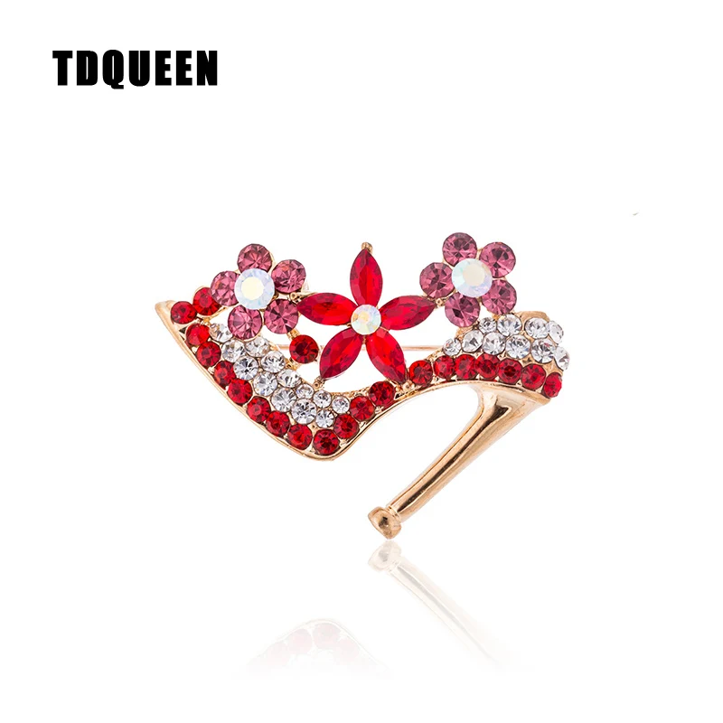 black heels with brooch