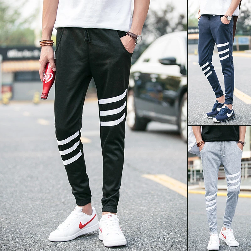 black skinny track pants