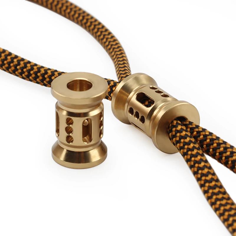 

Hollow Out Brass Knife Beads Umbrella Rope Cord Outdoor Knife Pendant EDC