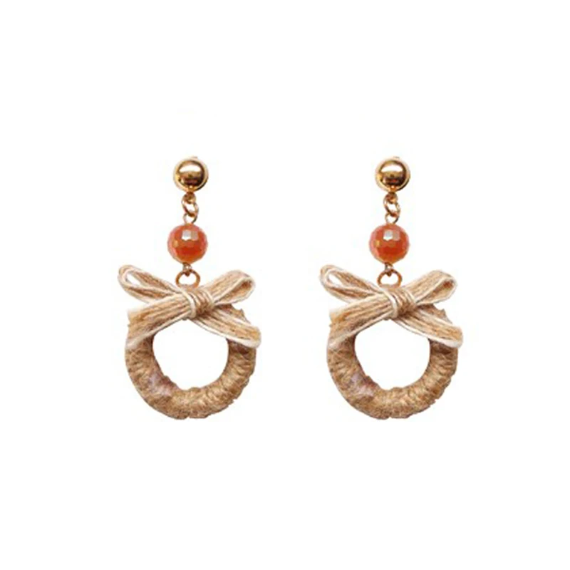 

High-quality winter earrings fashion knitting charm wool weaving Korean version of the bow studs Ms. daily jewelry